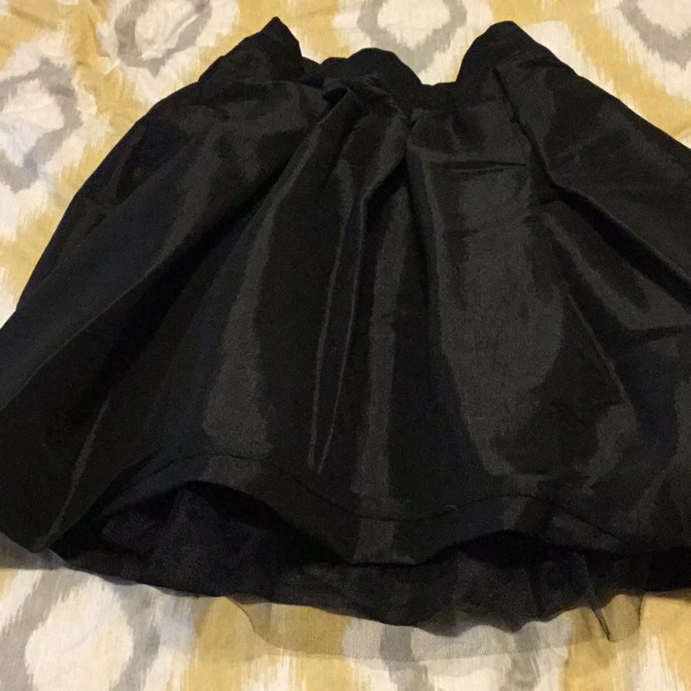 Pleated evening skirt with a crinoline